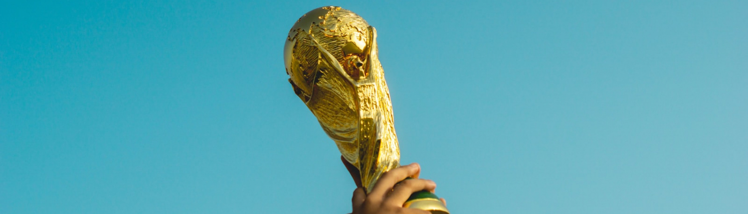 Photo by Fauzan Saari person holding gold trophy